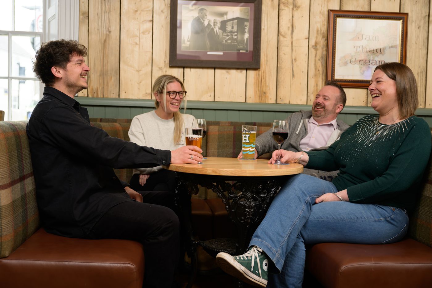 Friends sharing drinks in the bar